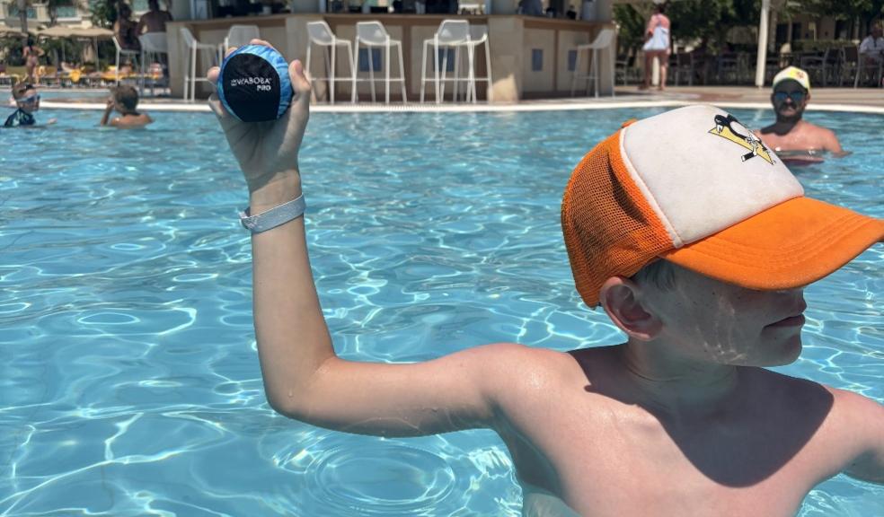 a child in the pool with the waboba pro swimming ball picture of a child in the pool with the waboba pro swimming ball