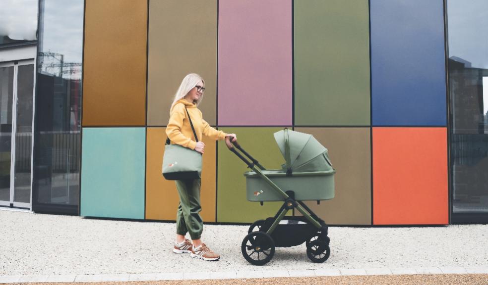 picture of a woman pushing the new Cosatto Giggle 4 stroller with new Hoglet colourway