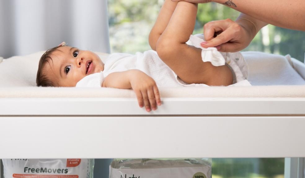 a baby having their nappy changed with naty baby wipes picture of a baby having their nappy changed with naty baby wipes