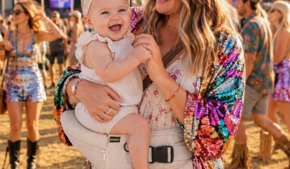 a happy mum and baby using the Hackerlily hipsurfer at a Festival picture of a happy mum and baby using the Hackerlily hipsurfer at a Festival