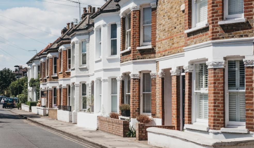 picture of a typical London street with terraced houses