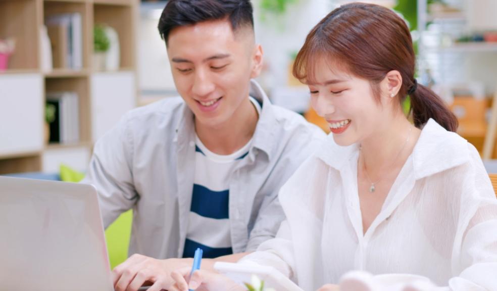 picture of a Couple discussing money