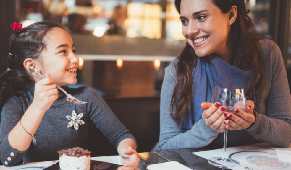 picture of a family eating out