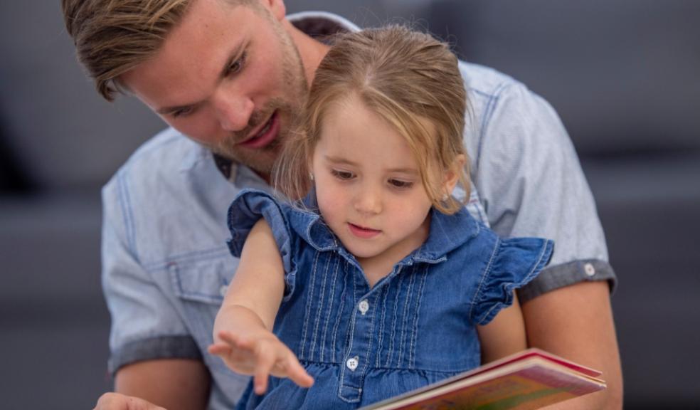 picture of Father and child reading