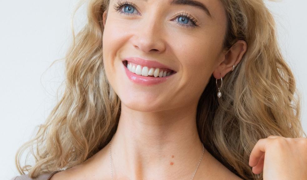 picture of a woman wearing a foxglove sterling silver necklace 