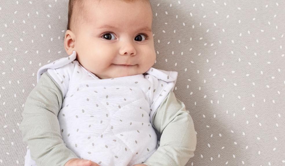 picture of a happy baby in The little green sheep bedding products