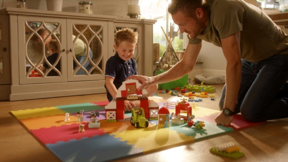 Picture of Jamie Vardy playing with lego with a child for celebrate like a pro campaign