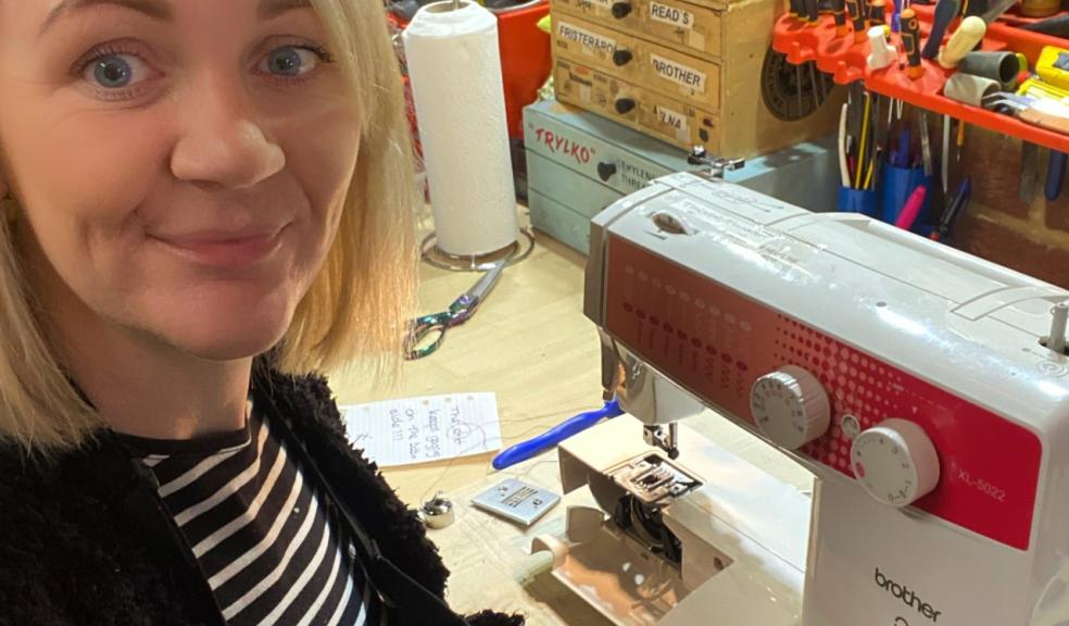 Katie sat at her sewing machine in K&B Sewing Machines