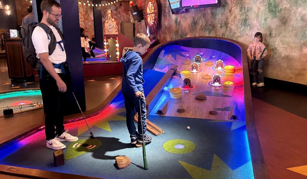 picture of children playing crazy golf at Puttshack London