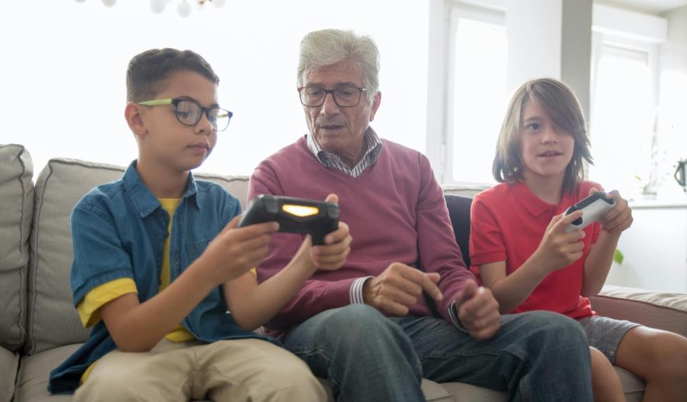 children playing video games with their grandparent picture of children playing video games with their grandparent