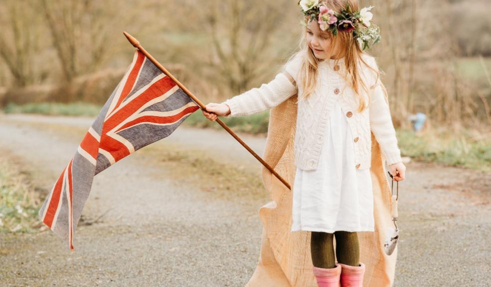 picture of a child holiday a union jack flag