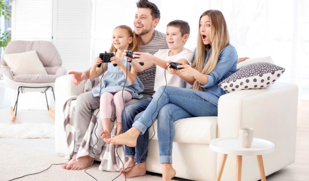Picture of a happy family playing video games together