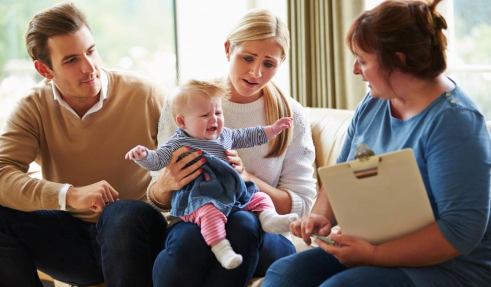 Picture of a family with a family support worker