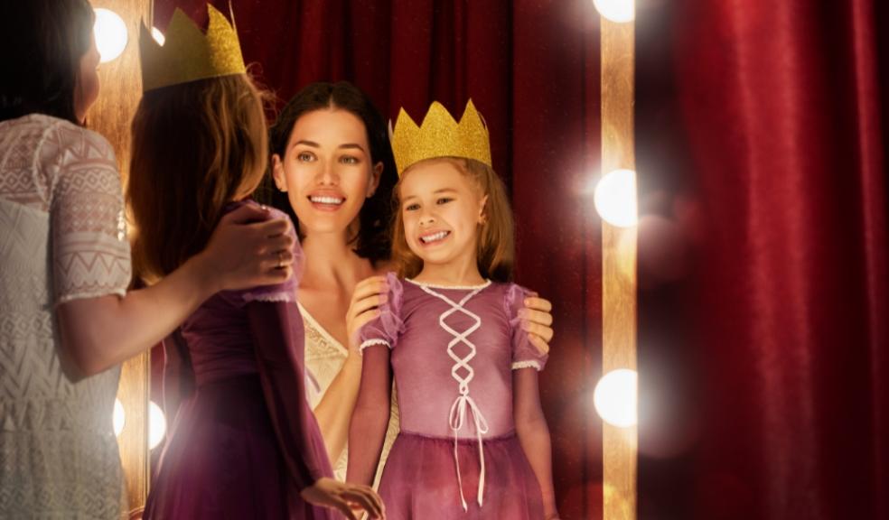 picture of a young child dressed as a queen in a drama class