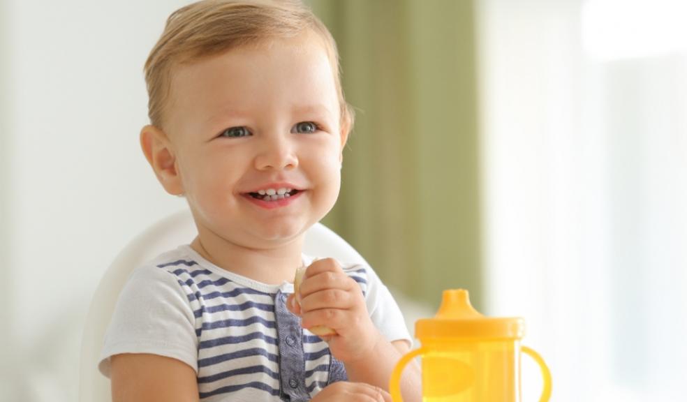 picture of a happy baby in a highchair