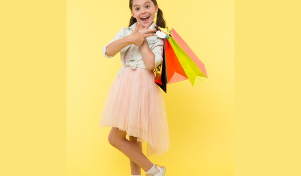 picture of a happy child shopping