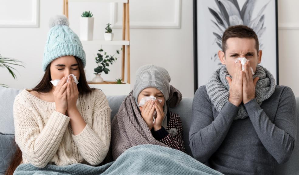 Picture of a family at home ill with the flu