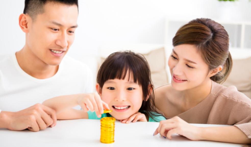 picture of a happy family learning about saving money