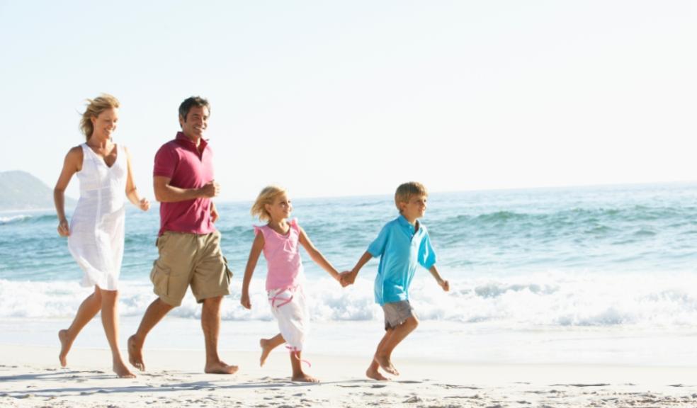 Picture of a happy family on a sunny beach holiday
