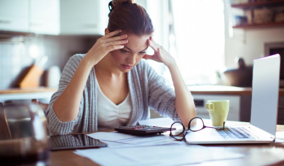 picture of woman working out family finances