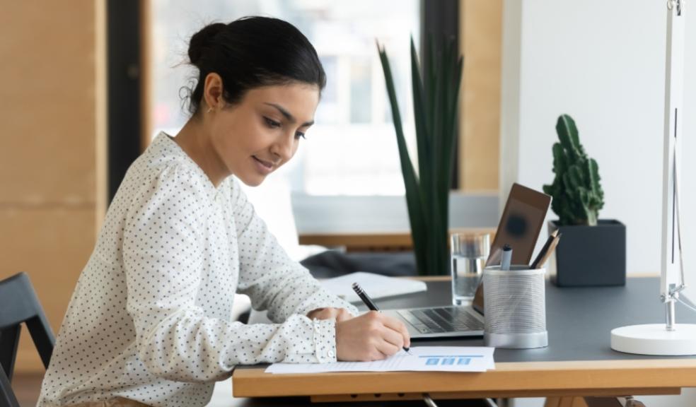 picture of a woman doing paperwork