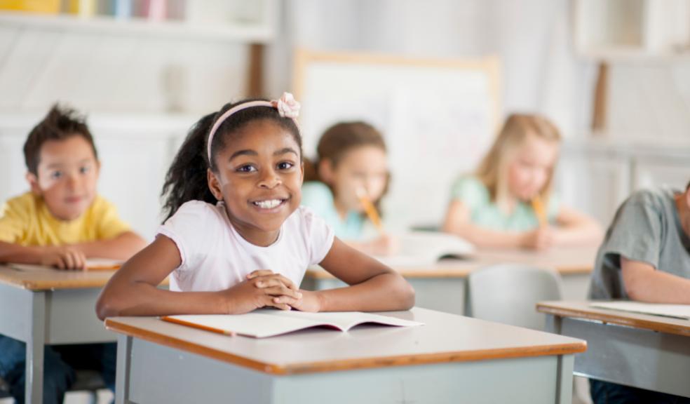 picture of a happy school child in a classroom
