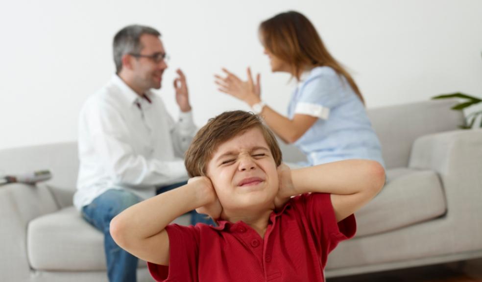 picture of a child with arguing parents