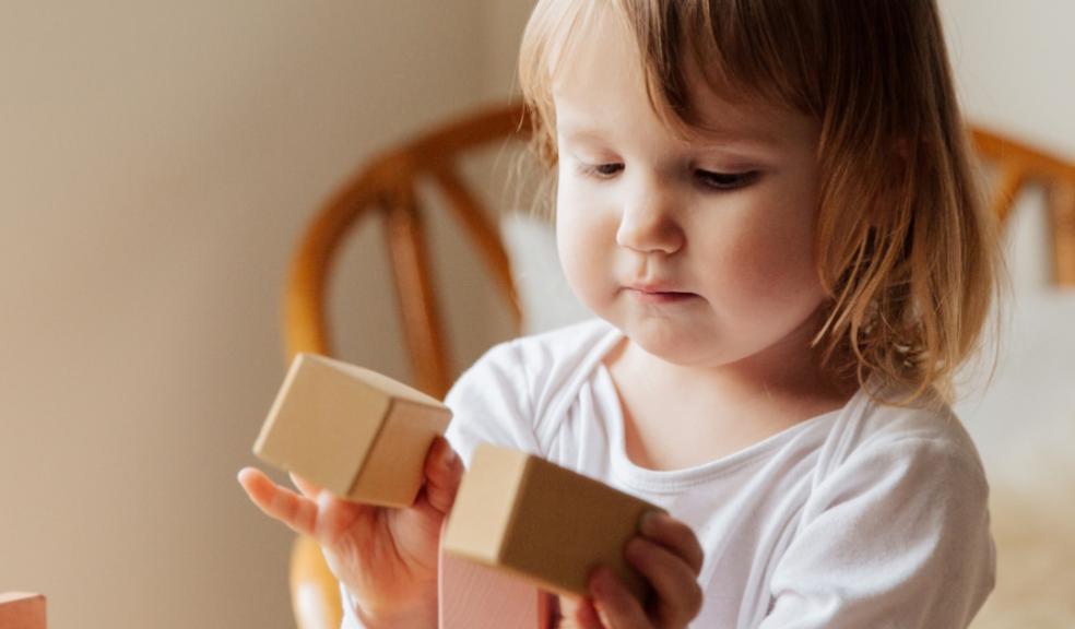 picture of a child playing with blocks