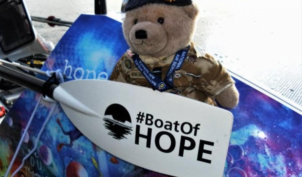 picture of boat of hope boat and bear