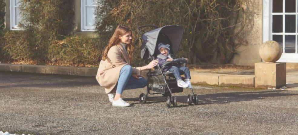 mother and baby with an aldi stroller