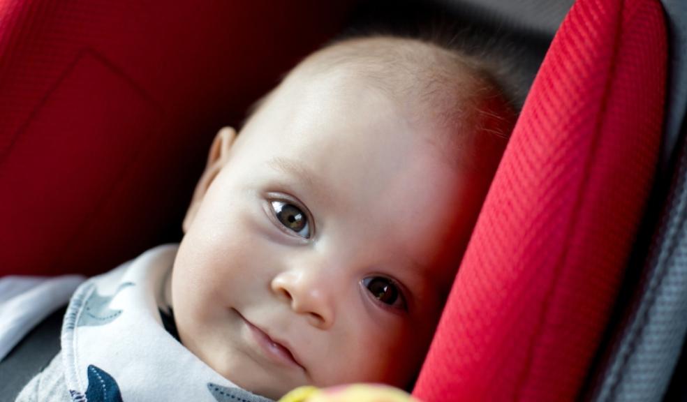 picture of a baby in a car seat