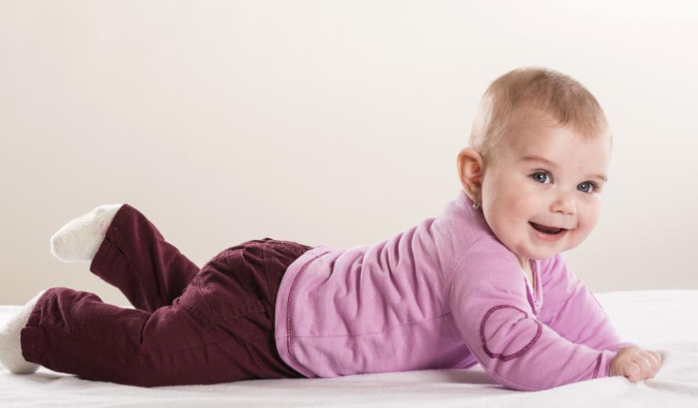 picture of a baby on a mattress