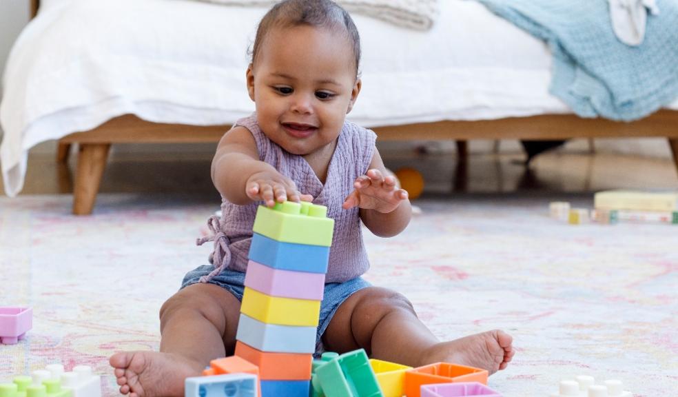 picture of baby playing with blocks