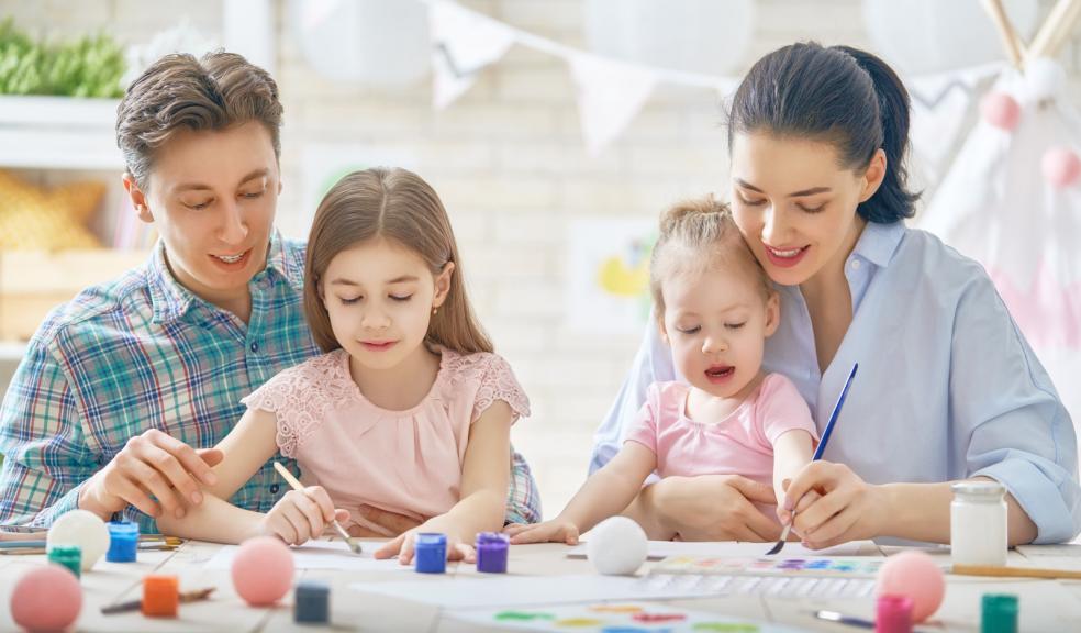 Picture of a family painting together