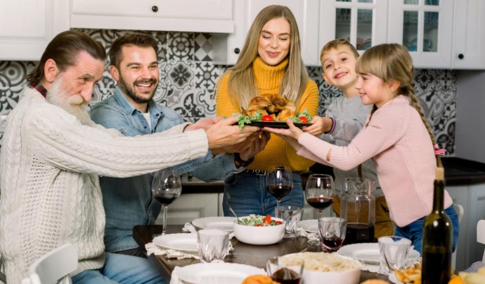 a happy family having sunday lunch as part of a family tradition picture of a happy family having sunday lunch as part of a family tradition