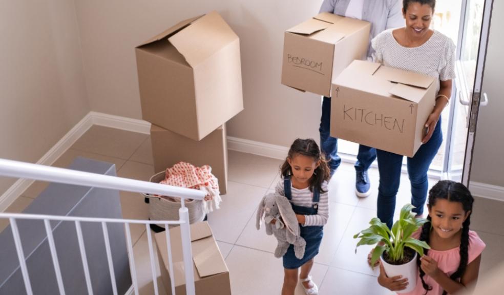 picture of a happy family moving house