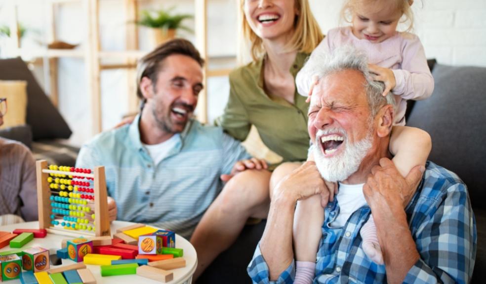 a happy three generational family members getting ready to talk about family finances people of a happy three generational family members getting ready to talk about family finances