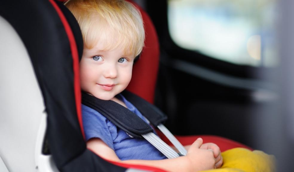 Picture of a cute child in a car seat