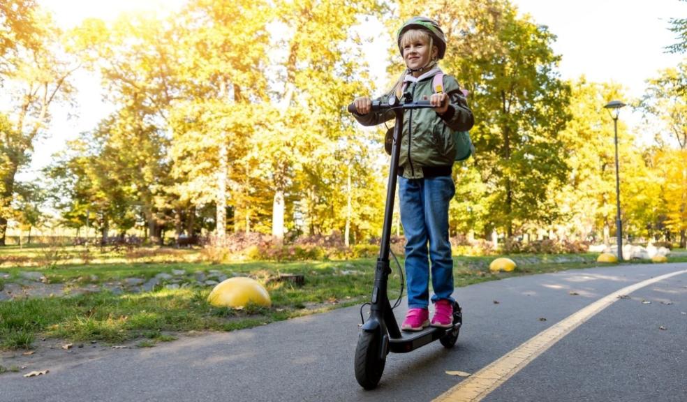 picture of a child on an e scooter