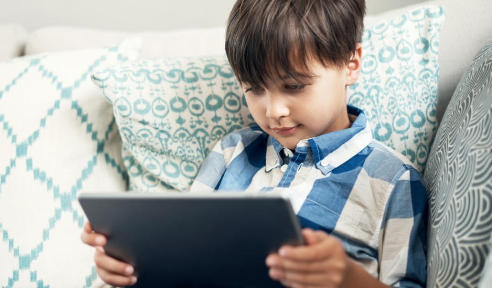 picture of a child using a screen