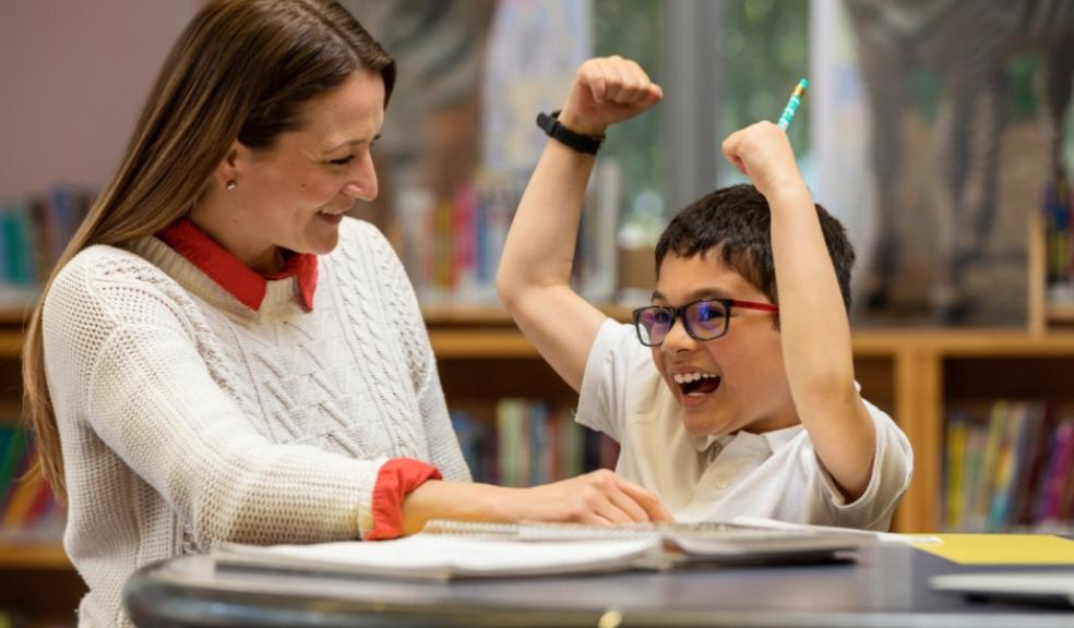 picture of a child with a tutor