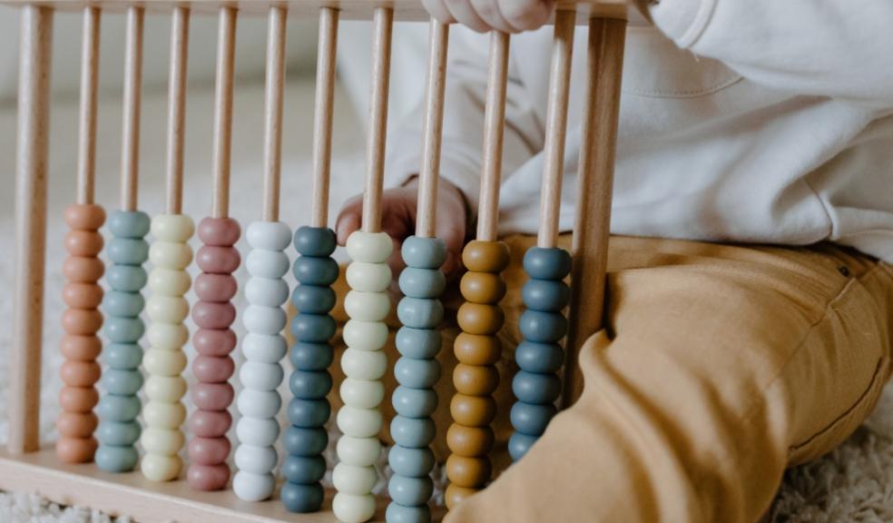 picture of a child with an abacus