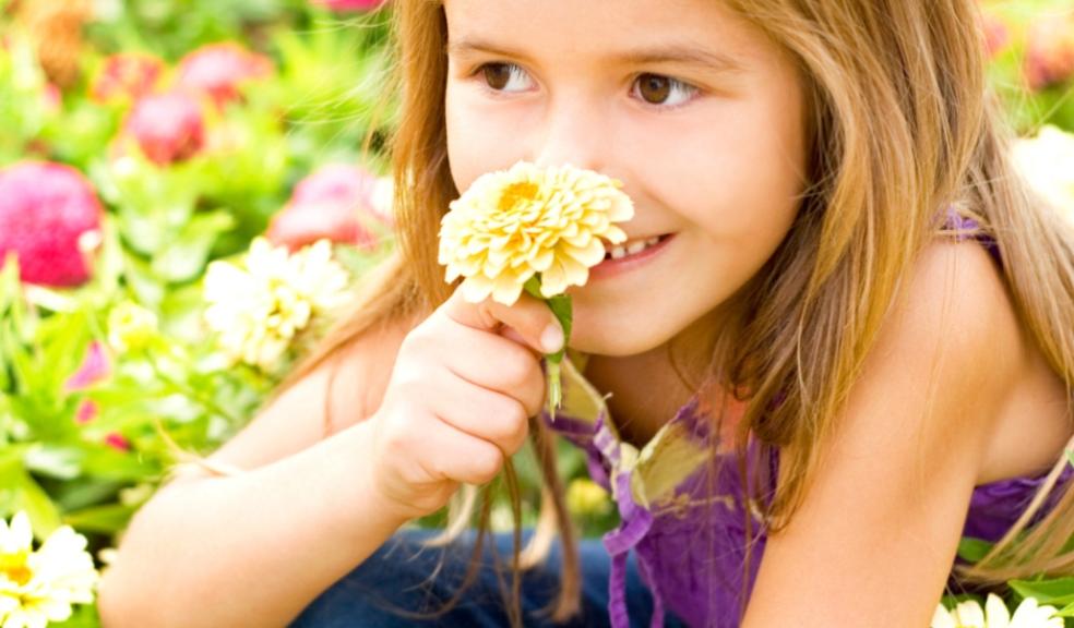 picture of a child with flowers
