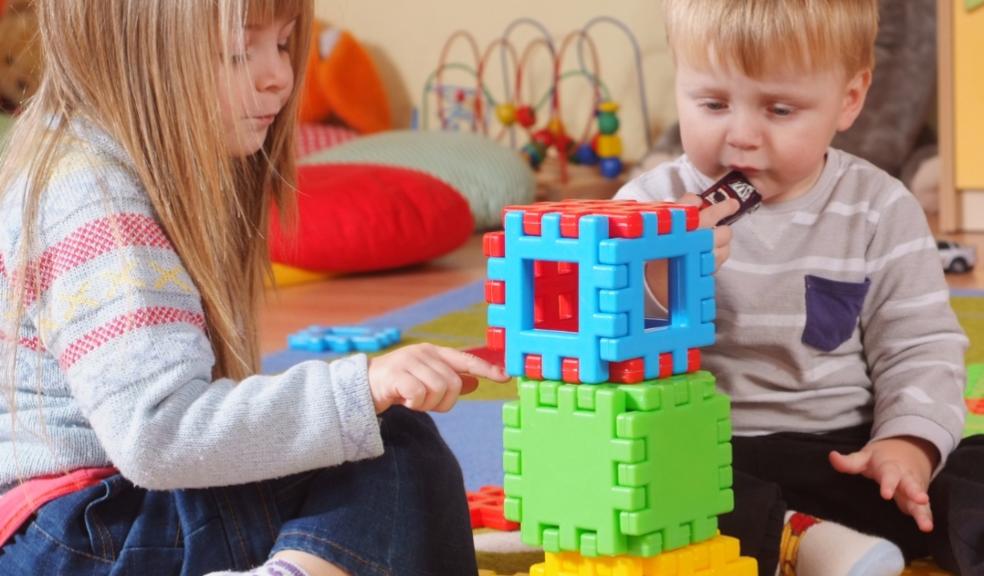 children playing in a nursery picture of children playing in a nursery