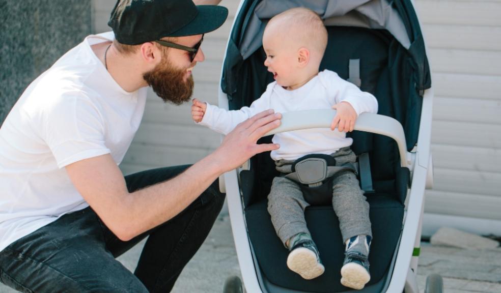 picture of a dad with baby in a stroller