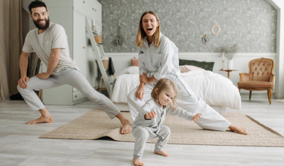 picture of a family doing yoga together