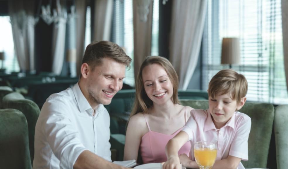 picture of a family eating in a nice restaurant