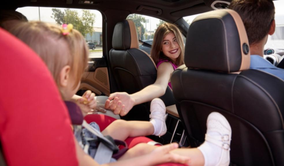 picture of a family in a car