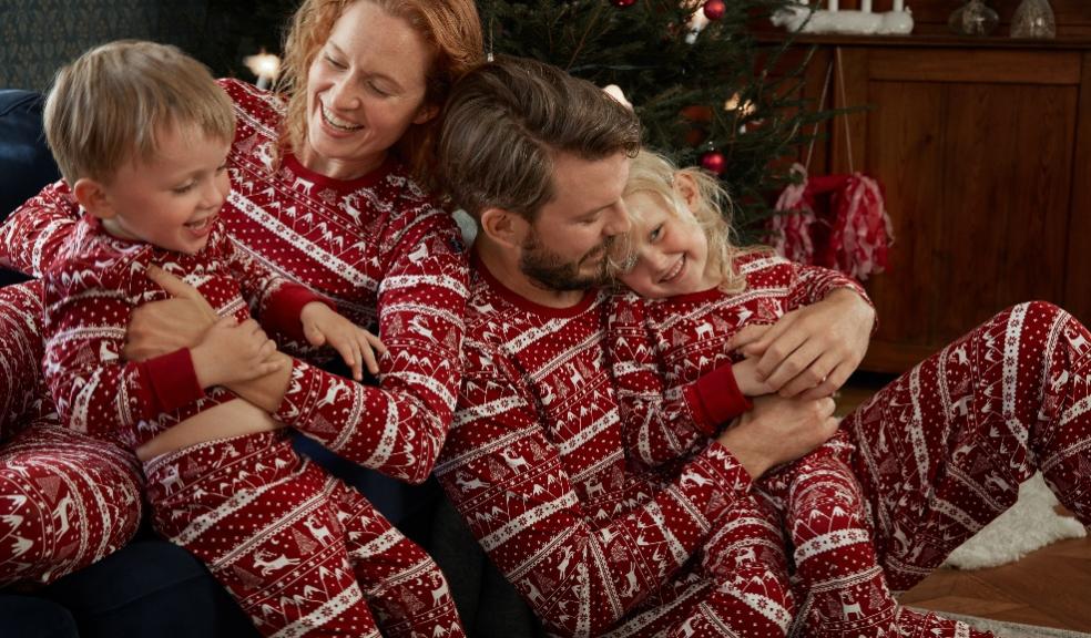 picture of a family in matching childrens pyjamas