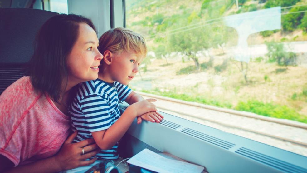 picture of a family on a train